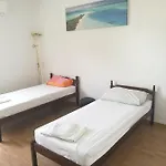 Проживание в семье And Cozy Two Single Bed *